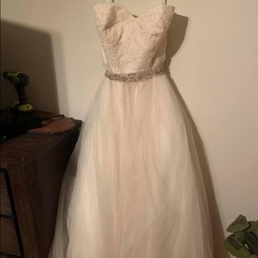 dress with corset back needs to be dry cleaned willing to negotiate price